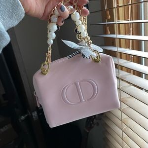 Christian Dior makeup Bag with chain.